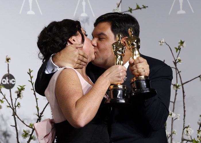 Kristen Anderson-Lopez and Robert Lopez celebrating Oscar win! Photo: indianexpress.com/photos/entertainment-gallery/oscar-2014-moments-too-sweet-to-be-missed/#kristen_lopez